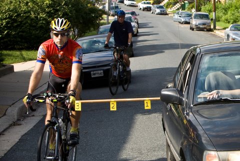 Biker shows what 3 feet looks like